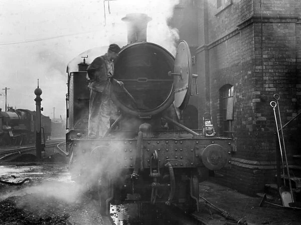 Steam locomotive being serviced, Exeter St David s