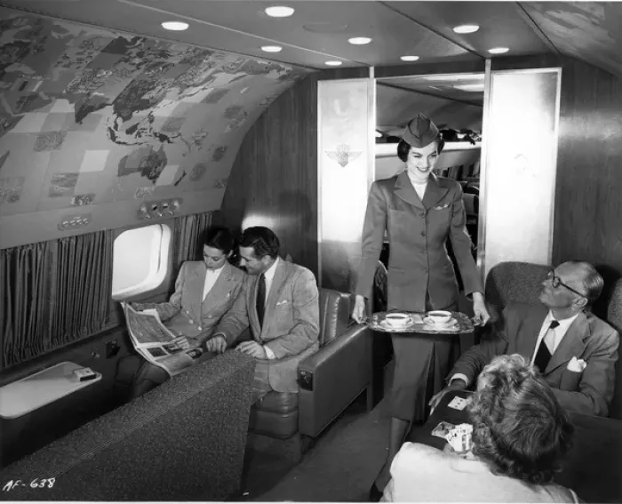 Framed Print : A stewardess serves tea Framed Print : A stewardess serves tea
