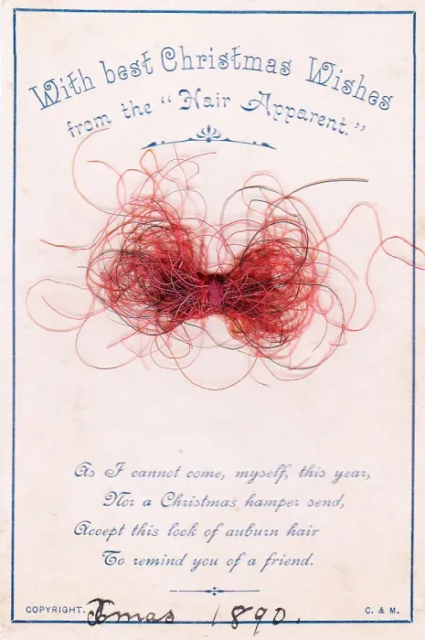 Framed Print : Strands of red hair with comic verse on a Christmas card Framed Print : Strands of red hair with comic verse on a Christmas card