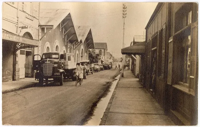 Framed Print : Street in the Far East, with shipping company and Dodge truck Date: late 1930s Framed Print : Street in the Far East, with shipping company and Dodge truck Date: late 1930s