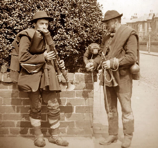 Street musicians with a monkey, Victorian period