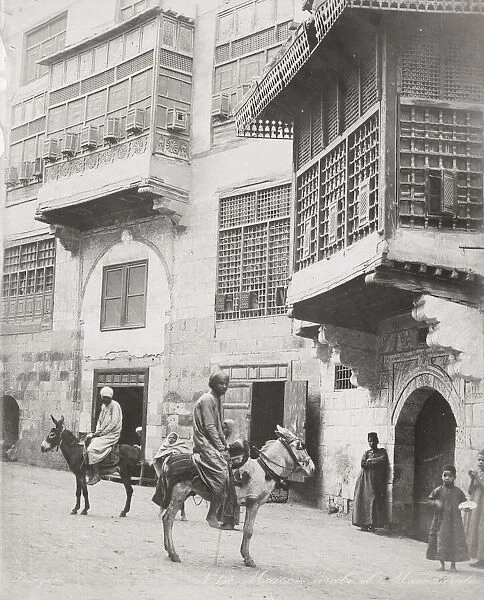 Street in old Cairo, Egypt, man on donkey
