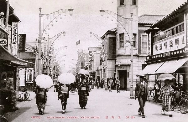 Street scene with parasols in Kobe, Japan