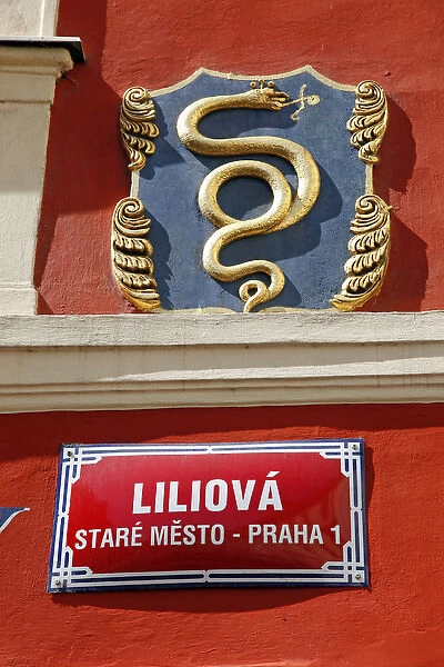 Street sign and snake in Prague