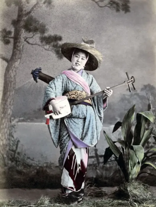 Framed Print : Street singer, Japan circa 1880s. Date: circa 1880s
