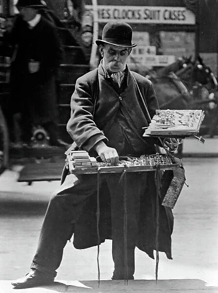 Street trader, London, early 1900s