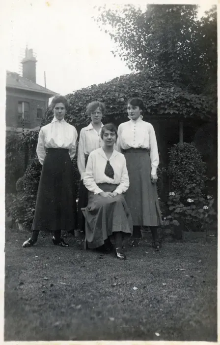 Framed Print : Four student friends posing for a group photograph