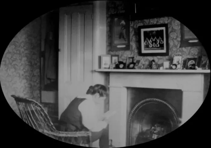 Framed Print : Student reading in study by a fire Framed Print : Student reading in study by a fire