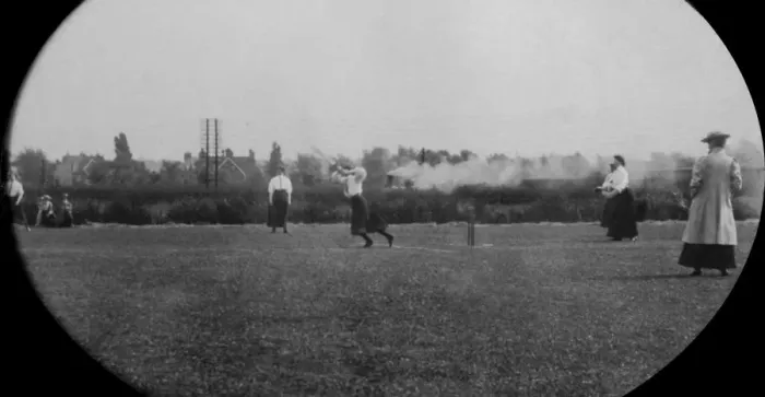 Framed Print : Students playing cricket steam train in background