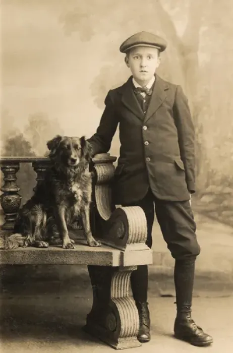 Framed Print : Studio portrait, boy with a dog Framed Print : Studio portrait, boy with a dog