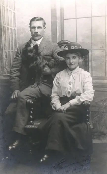 Framed Print : Studio portrait, couple with dog Framed Print : Studio portrait, couple with dog
