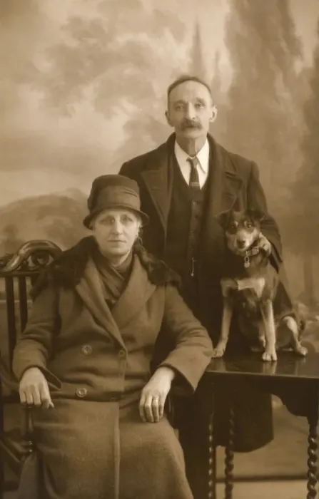 Framed Print : Studio portrait, couple with puppy Framed Print : Studio portrait, couple with puppy