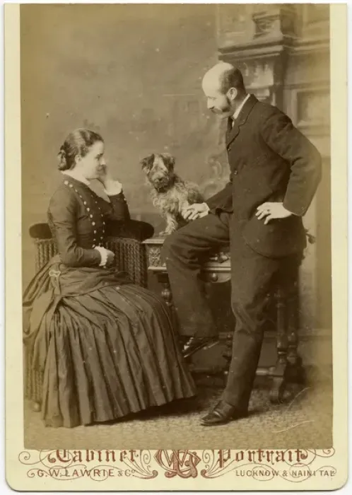 Framed Print : Studio portrait, couple with terrier dog Framed Print : Studio portrait, couple with terrier dog