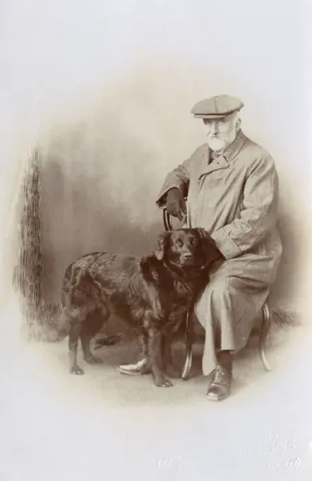 Framed Print : Studio portrait, elderly man with his dog Framed Print : Studio portrait, elderly man with his dog