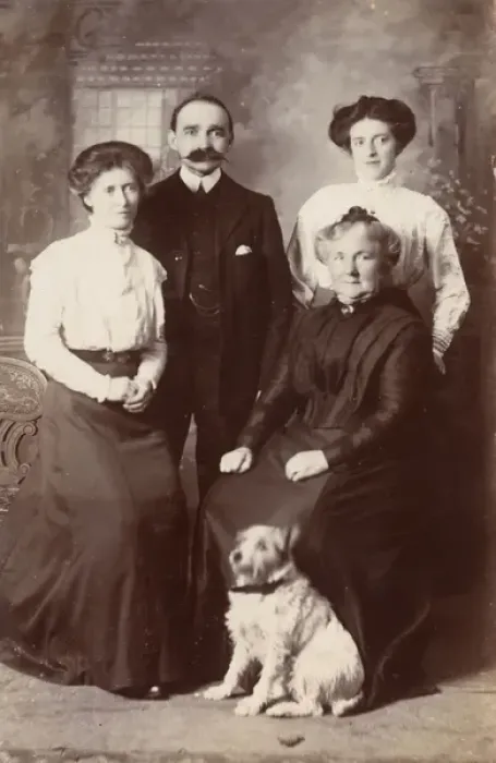 Framed Print : Studio portrait, family of four with terrier dog Framed Print : Studio portrait, family of four with terrier dog