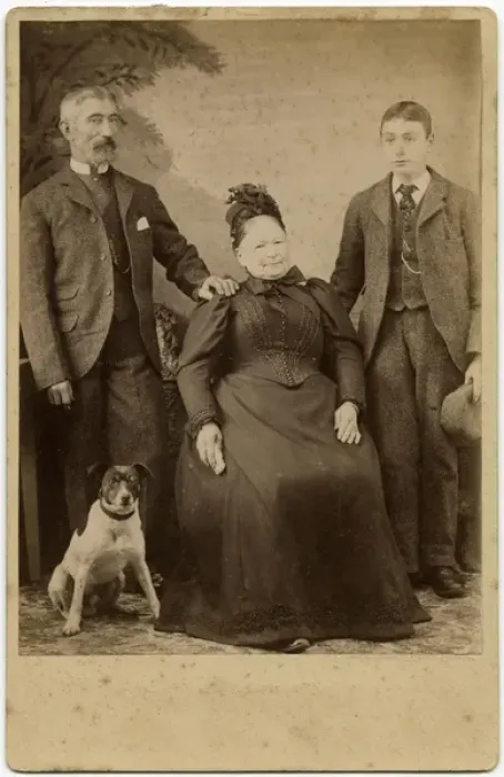 Framed Print : Studio portrait, family of three with terrier dog Framed Print : Studio portrait, family of three with terrier dog