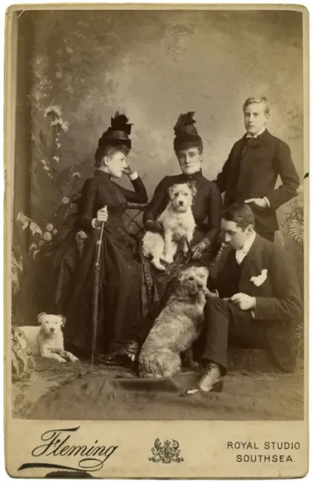 Framed Print : Studio portrait, family of four with three terrier dogs Framed Print : Studio portrait, family of four with three terrier dogs