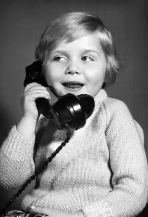 Framed Print : Studio portrait, little boy on the phone Framed Print : Studio portrait, little boy on the phone