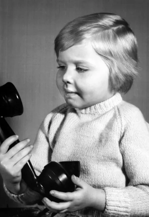 Framed Print : Studio portrait, little boy on the phone Framed Print : Studio portrait, little boy on the phone