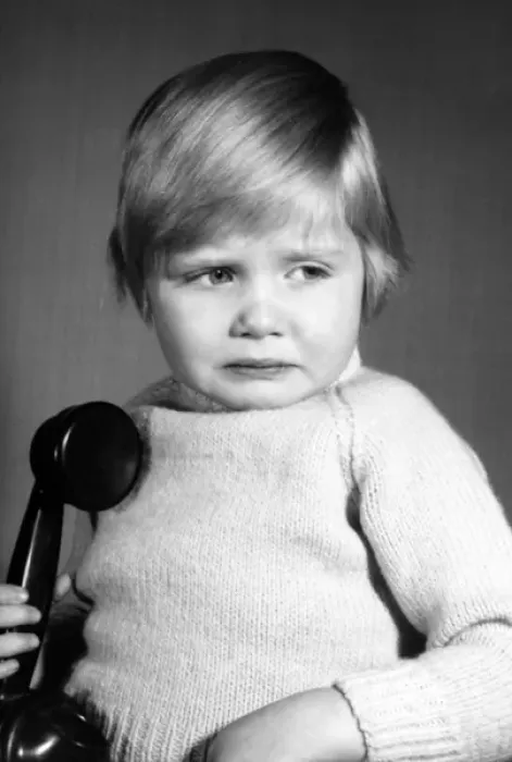 Framed Print : Studio portrait, little boy on the phone Framed Print : Studio portrait, little boy on the phone