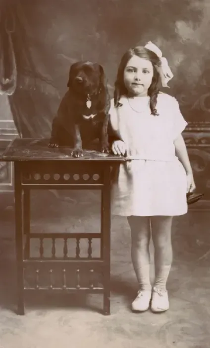 Framed Print : Studio portrait, little girl with her dog Framed Print : Studio portrait, little girl with her dog