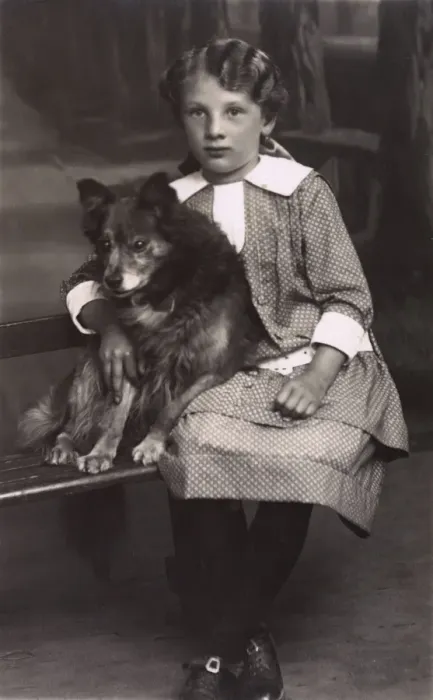 Framed Print : Studio portrait, little girl with a dog, Germany Framed Print : Studio portrait, little girl with a dog, Germany