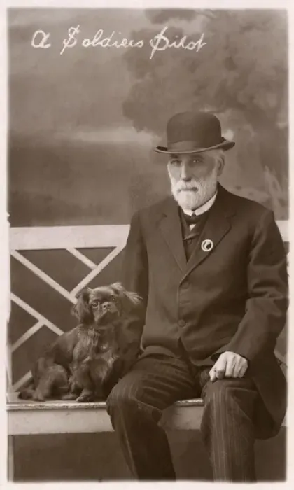 Framed Print : Studio portrait, man with Pekingese dog Framed Print : Studio portrait, man with Pekingese dog