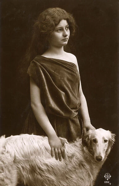 Studio portrait, woman with Borzoi dog