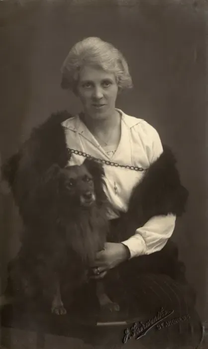 Framed Print : Studio portrait, woman with dog Framed Print : Studio portrait, woman with dog