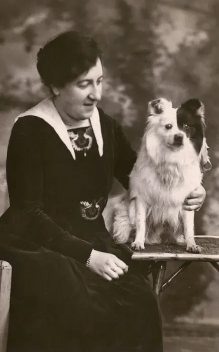 Framed Print : Studio portrait, woman with Pomeranian dog Framed Print : Studio portrait, woman with Pomeranian dog
