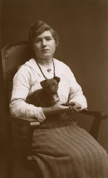 Framed Print : Studio portrait, woman with puppy Framed Print : Studio portrait, woman with puppy