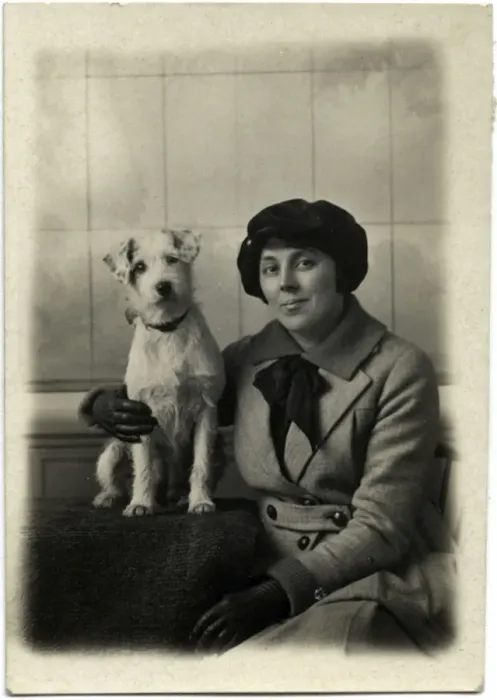 Framed Print : Studio portrait, woman with terrier dog Framed Print : Studio portrait, woman with terrier dog
