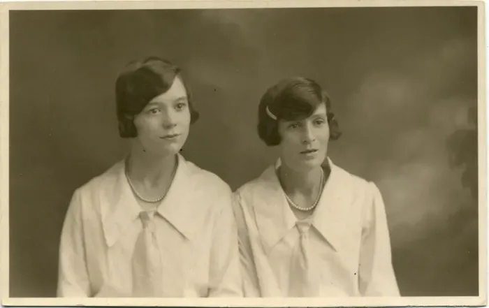 Framed Print : Studio portrait of two women, both with their dark hair bobbed Framed Print : Studio portrait of two women, both with their dark hair bobbed