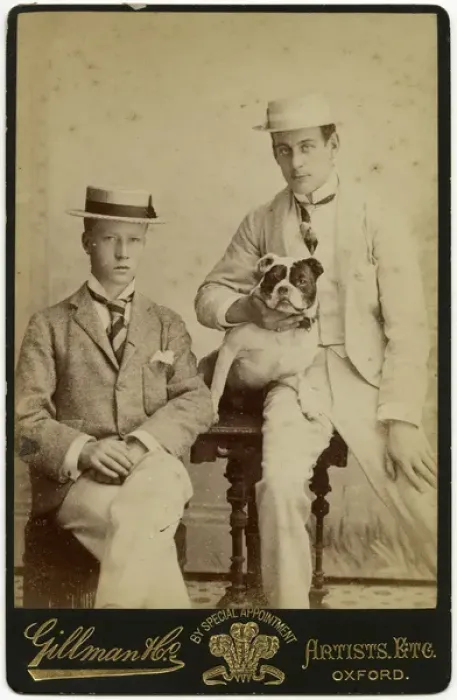Framed Print : Studio portrait, two young men with bulldog Framed Print : Studio portrait, two young men with bulldog