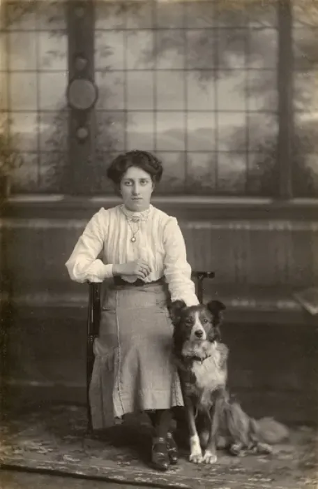 Framed Print : Studio portrait, young woman with dog Framed Print : Studio portrait, young woman with dog