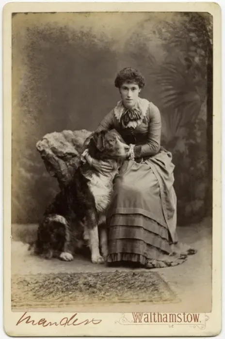 Framed Print : Studio portrait, young woman with large dog Framed Print : Studio portrait, young woman with large dog