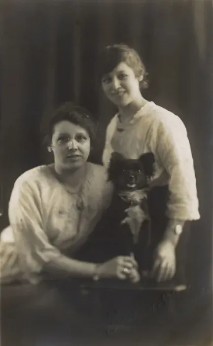 Framed Print : Studio portrait, two young women with dog Framed Print : Studio portrait, two young women with dog