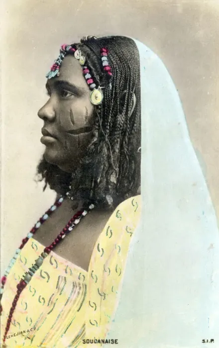 Framed Print : Sudanese woman showing traditional facial scarification and elegantly braided hair Framed Print : Sudanese woman showing traditional facial scarification and elegantly braided hair