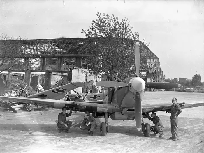 Framed Print : Supermarine Spitfire MkIX with wrecked Messerschmitt Bf 109G Framed Print : Supermarine Spitfire MkIX with wrecked Messerschmitt Bf 109G