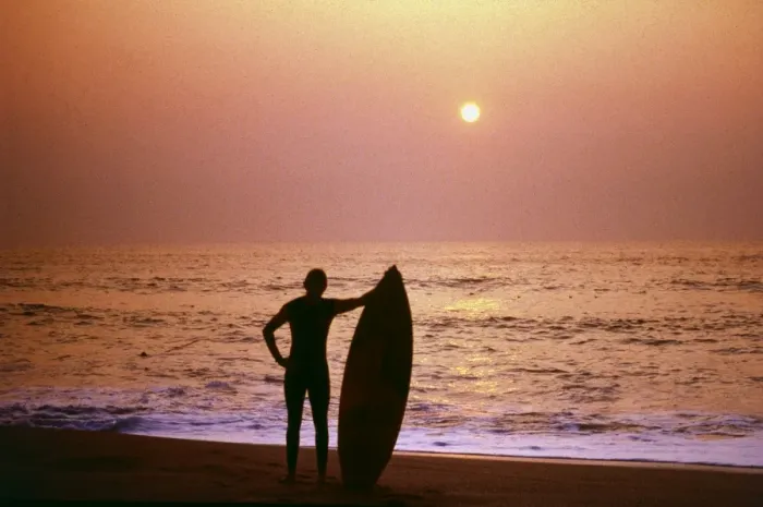 Framed Print : Surfer silhouetted against the sea Framed Print : Surfer silhouetted against the sea