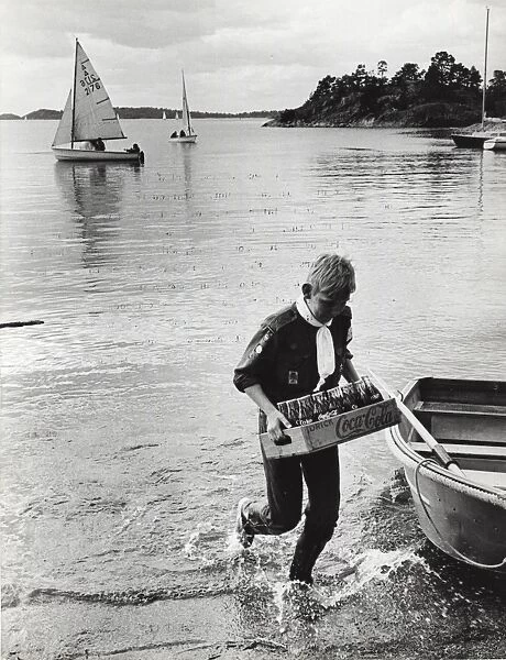 Swedish Scout bringing drinks ashore