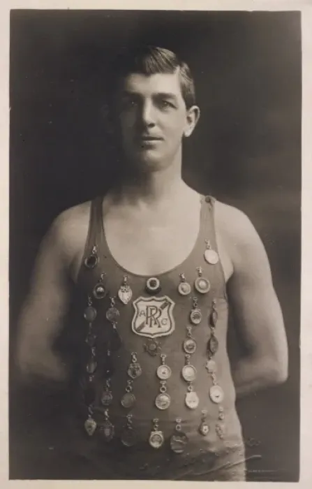 Framed Print : Swimming champion with medals on his costume Framed Print : Swimming champion with medals on his costume