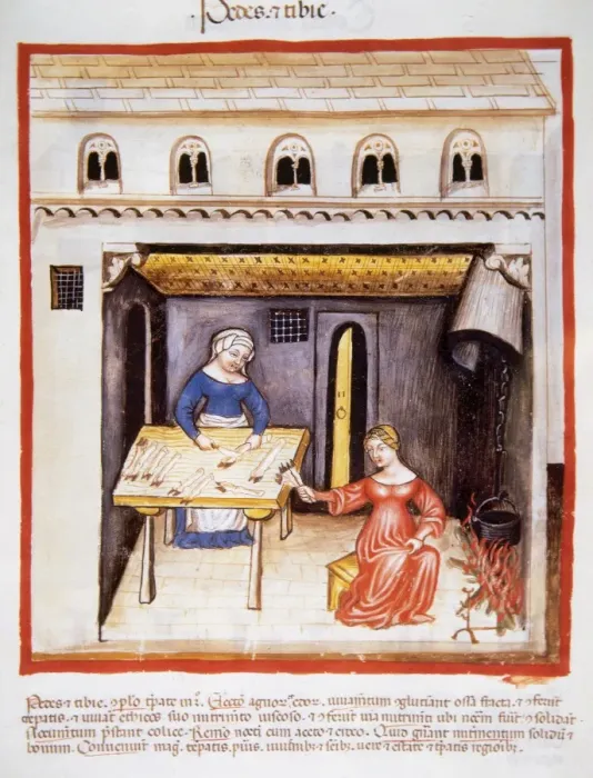 Framed Print : Tacuinum Sanitatis. 14th century. Women cutting pigs trotte Framed Print : Tacuinum Sanitatis. 14th century. Women cutting pigs trotte