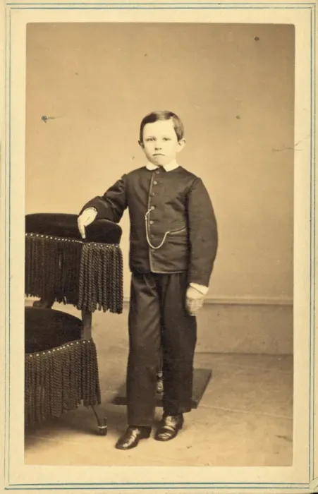 Framed Print : Tad Lincoln, standing, leaning against a chair Framed Print : Tad Lincoln, standing, leaning against a chair
