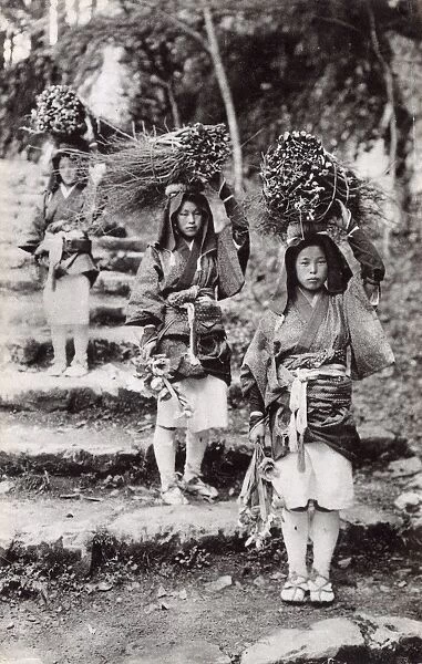 Taiwan - Country Girls with bundles of firewood for sale