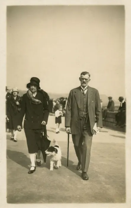 Framed Print : Taking dog for a walk along the seafront at Scarborough Framed Print : Taking dog for a walk along the seafront at Scarborough