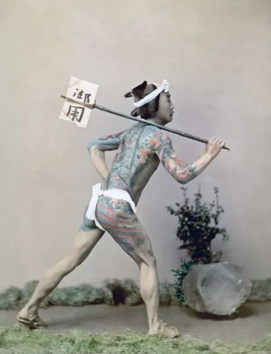 Framed Print : Tattooed post runner with letter, Japan, circa 1880s Framed Print : Tattooed post runner with letter, Japan, circa 1880s