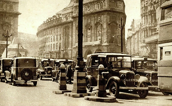 Taxis at Piccadilly Circus, London