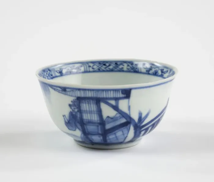Framed Print : Tea bowl. Porcelain tea bowl with cobalt blue underglaze decoration of three figures Framed Print : Tea bowl. Porcelain tea bowl with cobalt blue underglaze decoration of three figures