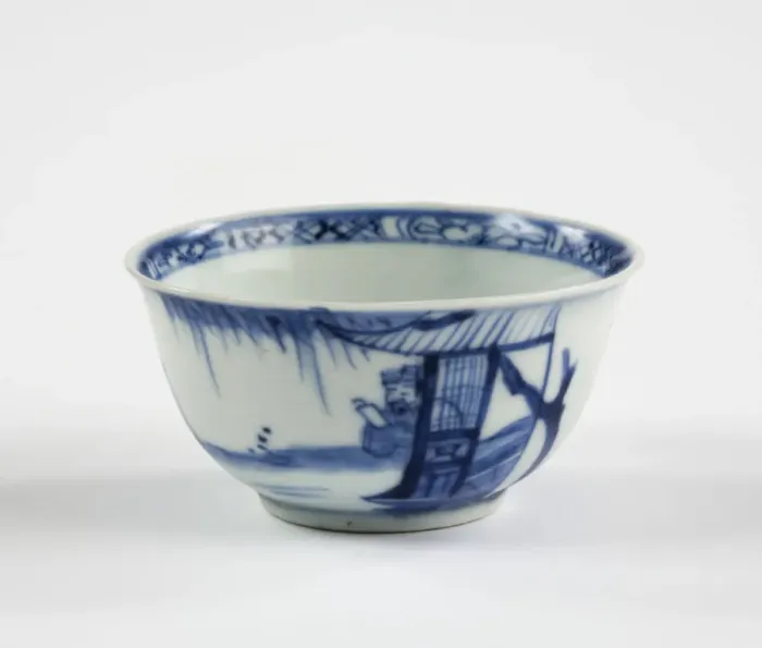 Framed Print : Tea bowl. Porcelain tea bowl with cobalt blue underglaze decoration of three figures Framed Print : Tea bowl. Porcelain tea bowl with cobalt blue underglaze decoration of three figures